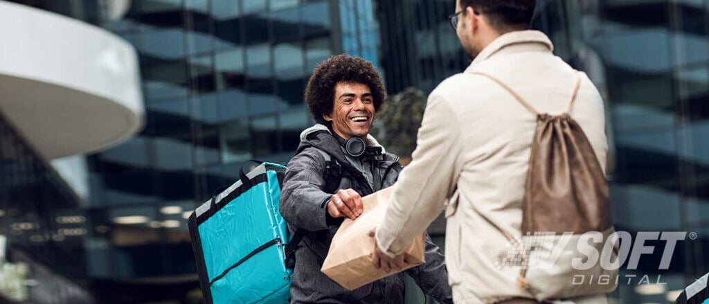 Quick Service Restaurant Food Delivery worker handing food to customer