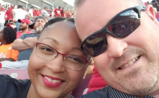 LaToya Barber with her husband at a University of Louisville basketball game.